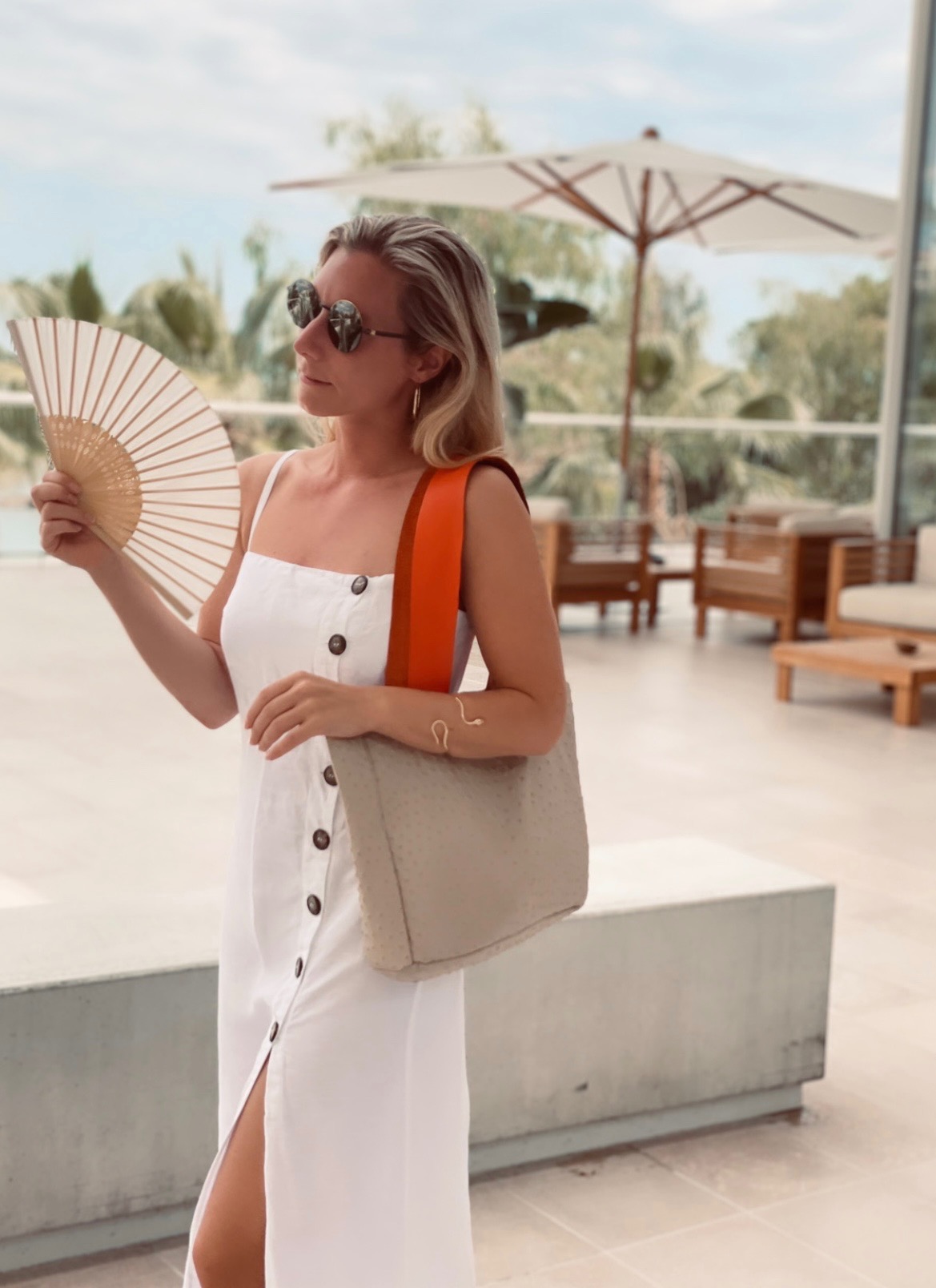 Marina wearing the META Monte Leather Tote Bag and the META Passion Flame Serpent Cuff (18k gold)